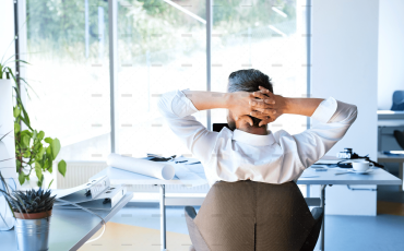 demo-attachment-477-Businessman-at-the-desk-in-his-office-resting.